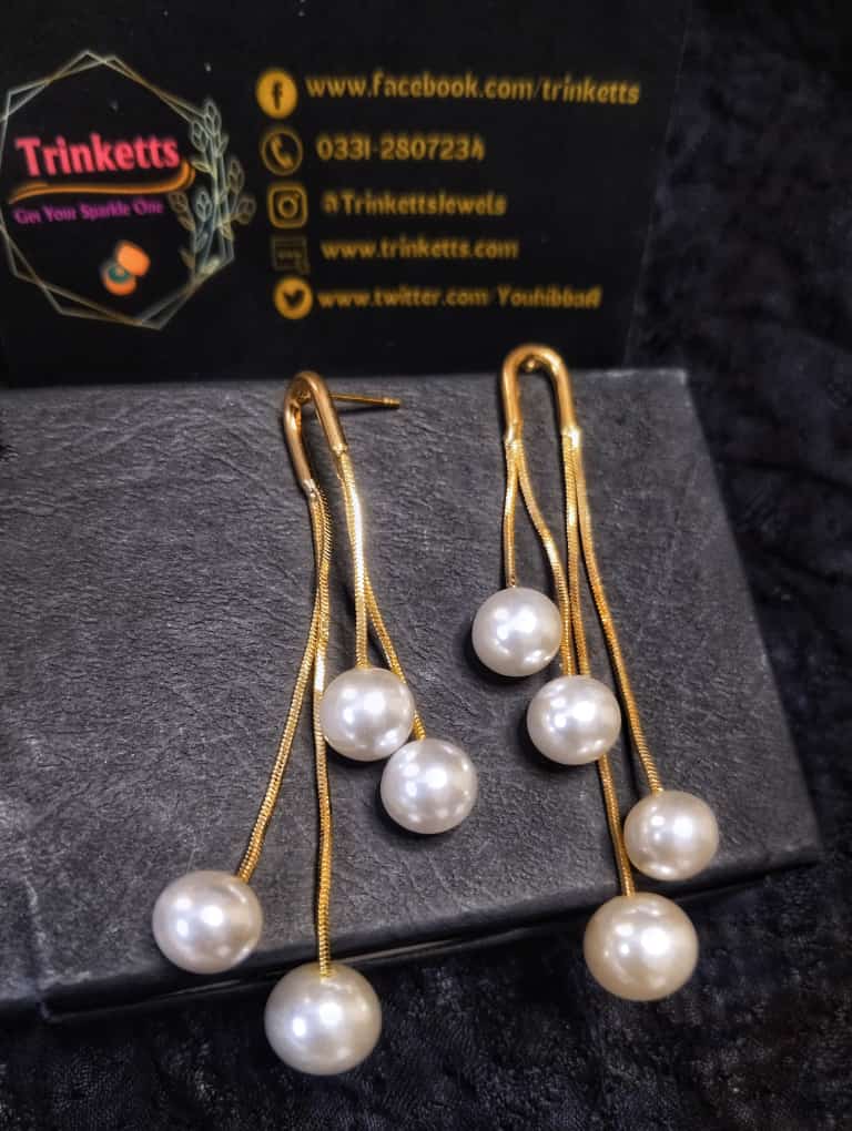 Pearl Cascade Dangle Earrings: Three chains with lustrous pearls gracefully suspended for an elegant and captivating accessory