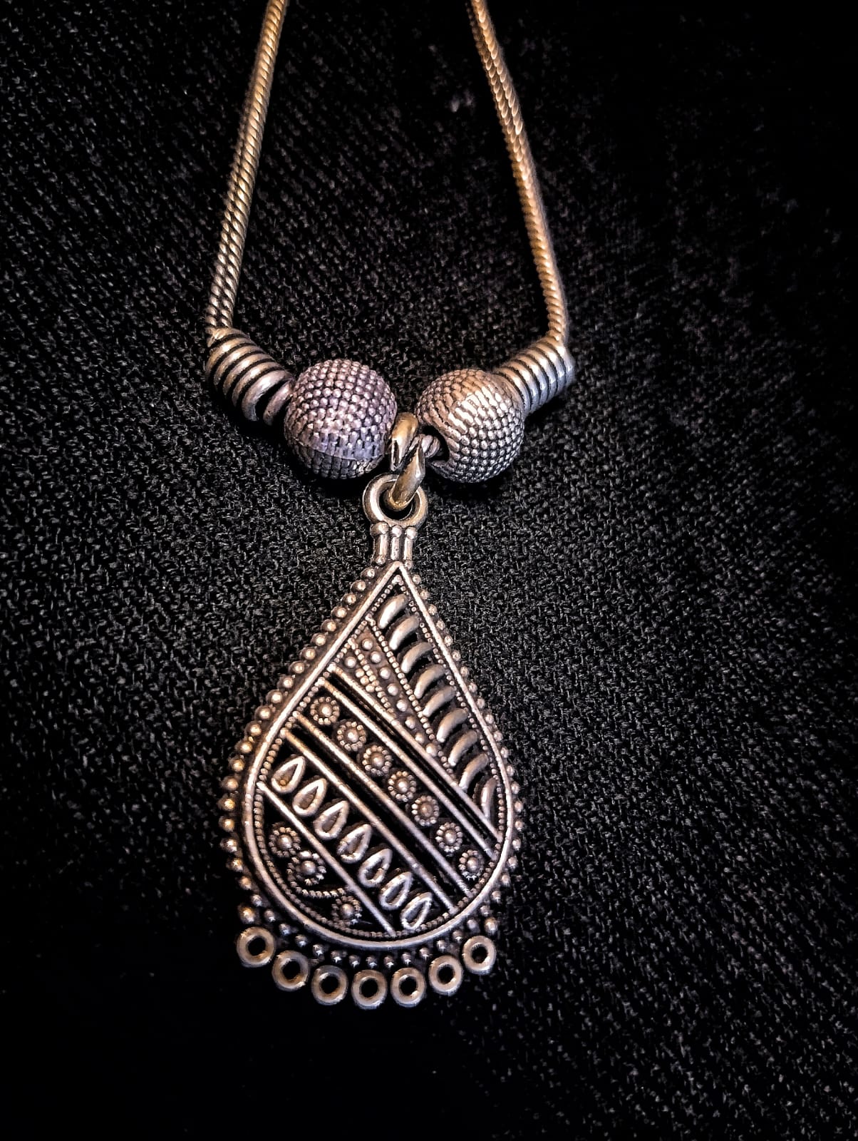 Close-up View of Oxidized Silver Drop Pendant