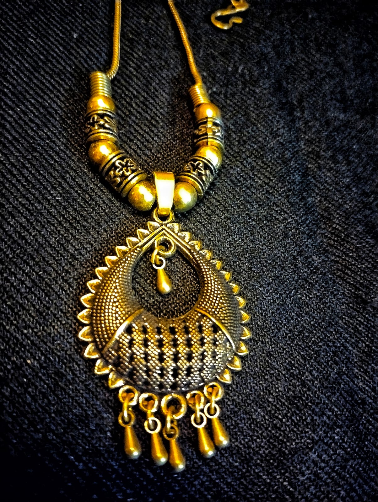 Close-up of Oxidized Golden Chandelier Pendant - Trinketts Jewelry
