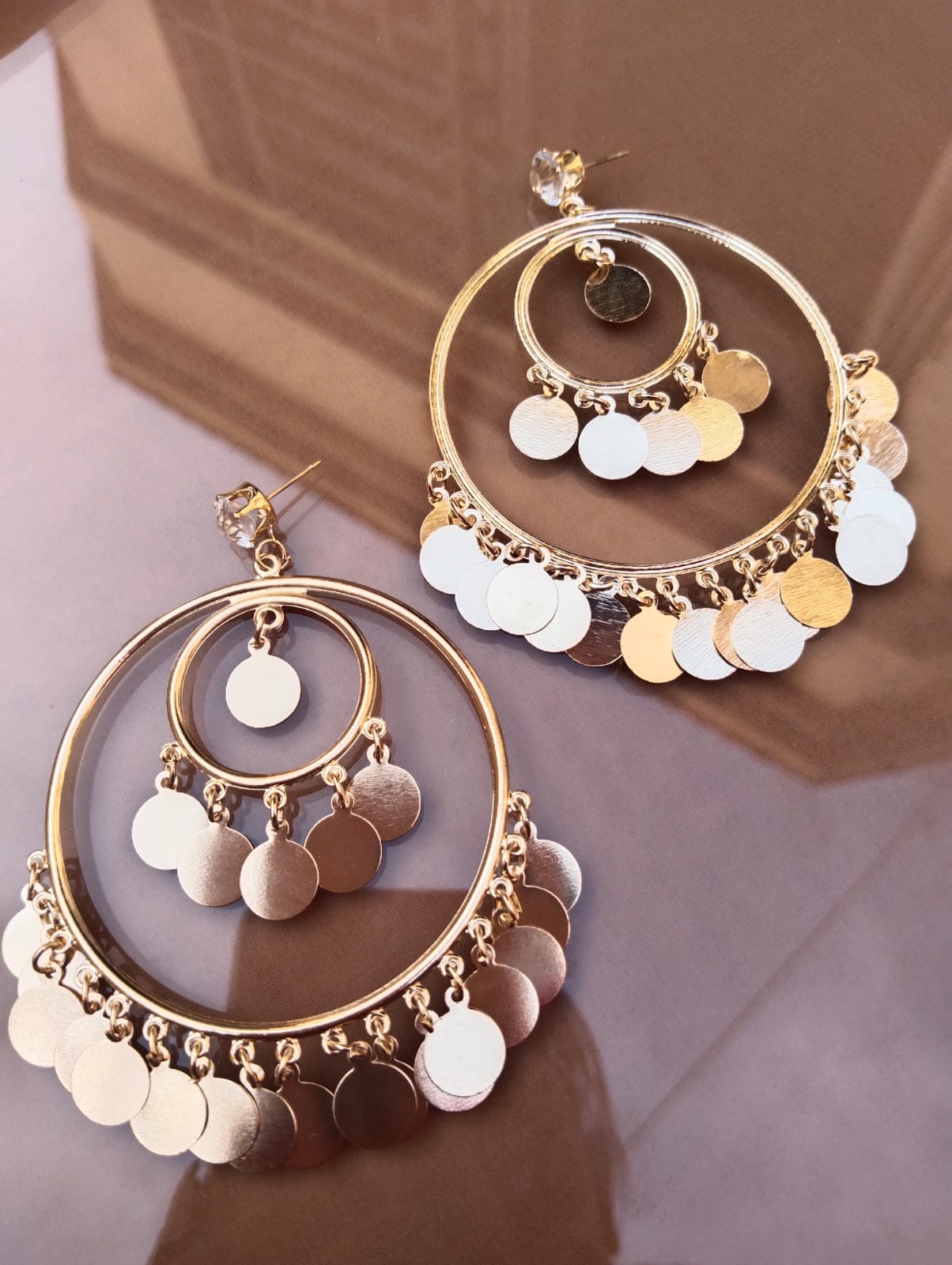 "Trinketts Dazzling Hoop Ensemble Earrings - silver glossy Hoops with Coin-Like Hangings, Lightweight and Statement-Making, Approx. 3 Inches in Size, Affordable Luxury at Rs. 380."